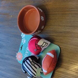 Small dog toys and ceramic bowl